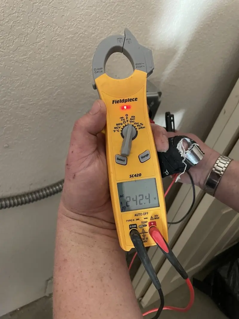 Voltage testing with clamp meter during Aluminum Wiring Replacement in Findlay